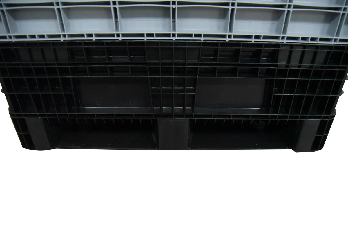 Plastic pallet container base and forklift entry detail